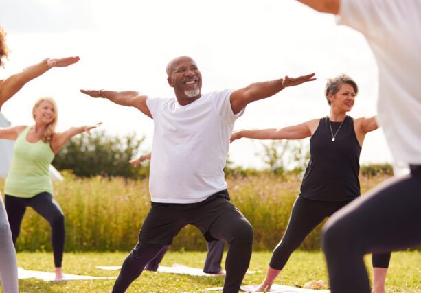 Female,Teacher,Leading,Group,Of,Mature,Men,And,Women,In