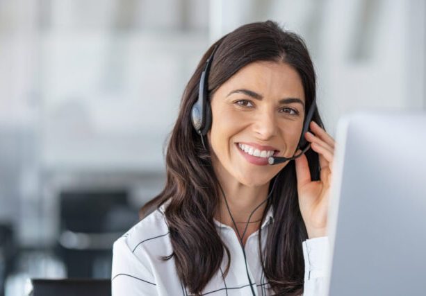Call,Center,Agent,With,Headset,Working,On,Support,Hotline,In