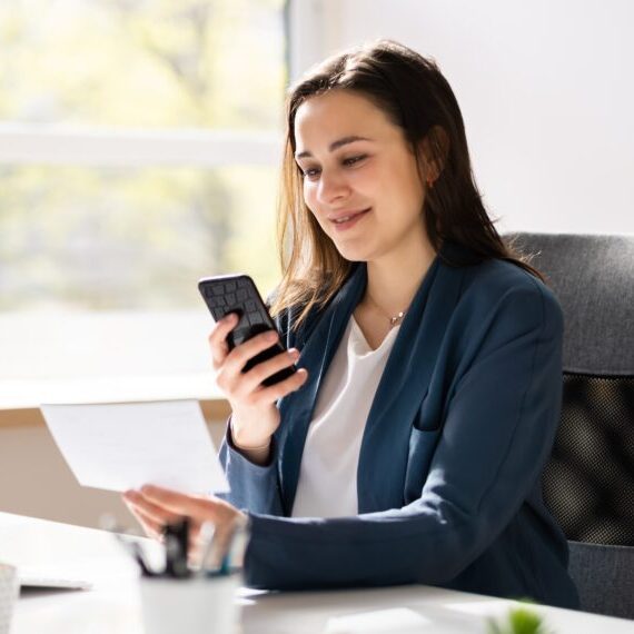 Remote,Check,Deposit,Taking,Photo,With,Mobile,Phone