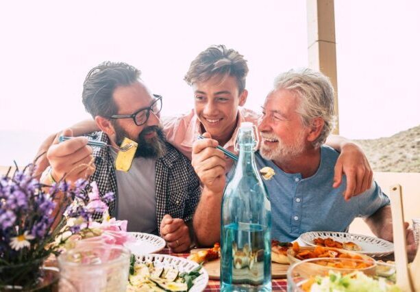Father,Grandfather,And,Son,Eaing,Together,Having,Fun.,Father's,Day
